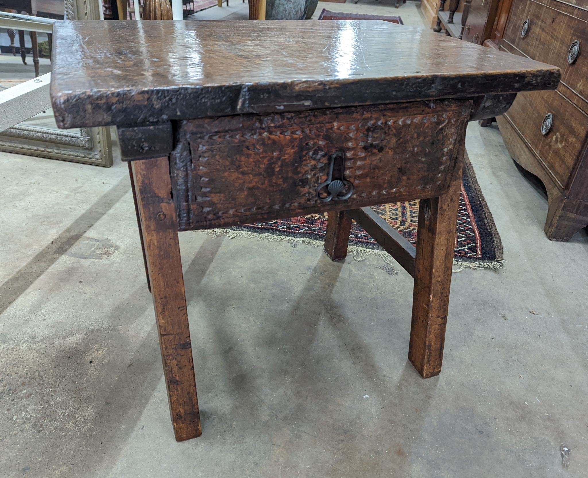 A pair of Spanish style fruitwood side tables (wormed), width 66cm, depth 50cm, height 56cm